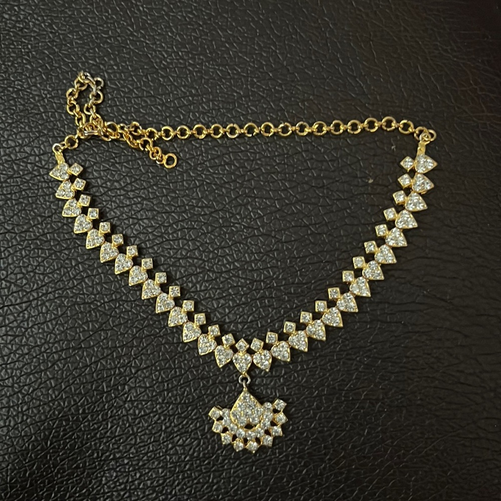 Gold statement necklace with silver diamonds